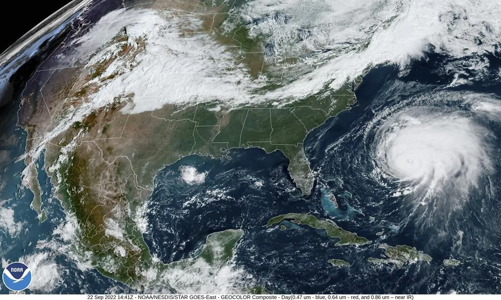 This satellite image provided by NOAA shows Hurricane Fiona in the Atlantic Ocean near Bermuda, moving north on Sept. 22, 2022. (NOAA via AP)