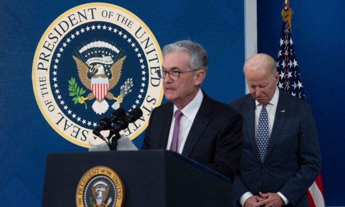 Federal Reserve Chair Jerome Powell (L) speaks as President Joe Biden (R) listens during an announcement at the White House in Washington, on Nov. 22, 2021. (Jim Watson/AFP via Getty Images)