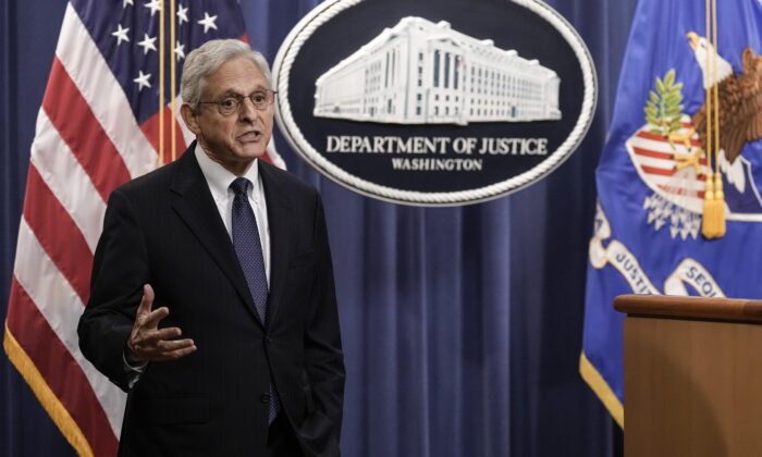 Attorney General Merrick Garland tells reporters Aug. 11, 2022, that he won't take questions about the FBI's raid on former President Donald Trump's home in Florida. (Drew Angerer/Getty Images)