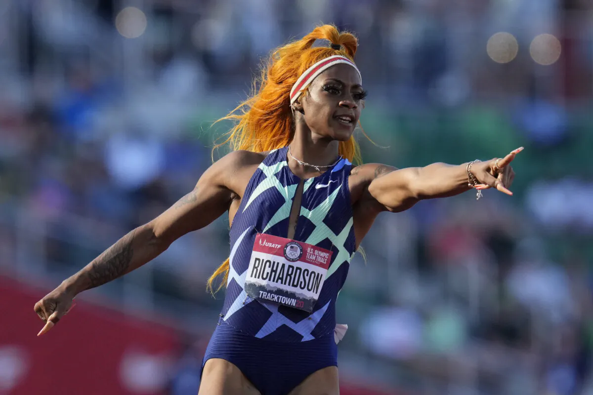 United States sprinter Sha'Carri Richardson celebrates after winning the first heat of the semis finals in women's 100-meter run at the U.S. Olympic Track and Field Trials in Eugene, Ore., on June 19, 2021. (Ashley Landis/AP Photo)