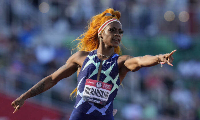 United States sprinter Sha'Carri Richardson celebrates after winning the first heat of the semis finals in women's 100-meter run at the U.S. Olympic Track and Field Trials in Eugene, Ore., on June 19, 2021. (Ashley Landis/AP Photo)