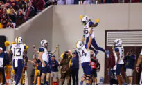 Daniels, Defense Lead West Virginia Past Virginia Tech 33–10