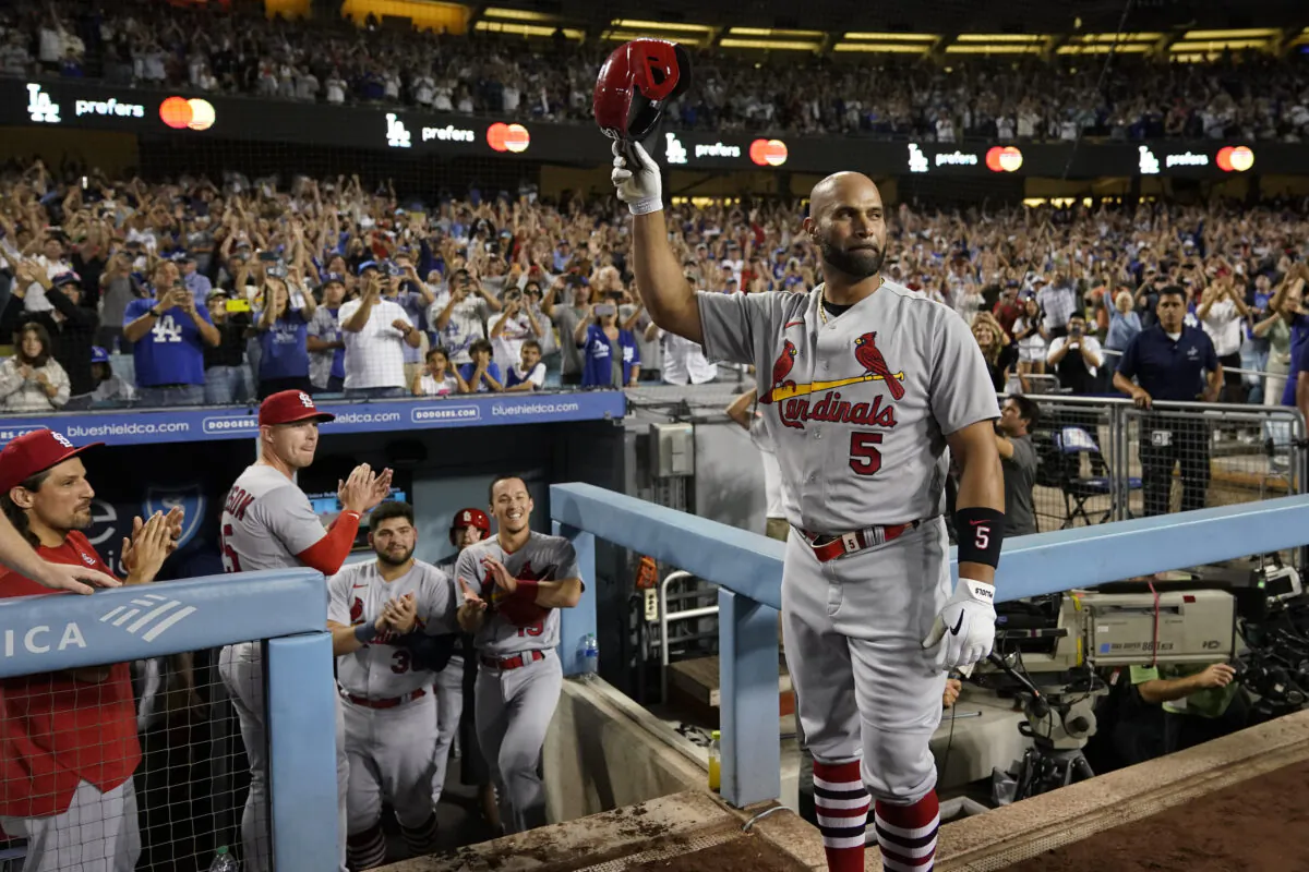St. Louis Cardinals designated hitter Albert Pujols (5) celebrates after hitting his 700th career home run during the fourth inning of a baseball game against the Los Angeles Dodgers in Los Angeles, on Sept. 23, 2022. (Ashley Landis/AP Photo)
