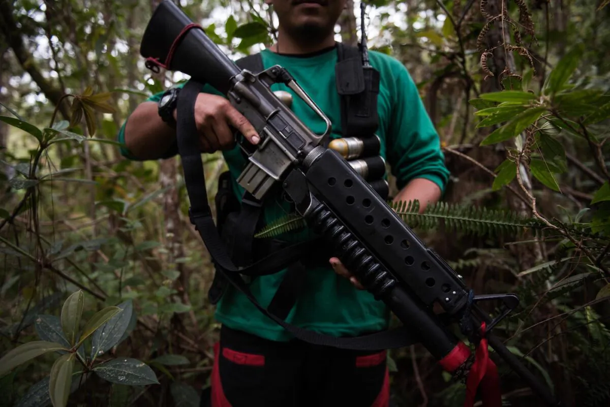 A guerilla of the New People's Army (NPA) displays his firearm on April 1, 2017 in the remote hinterlands of Mountain Province, Philippines. (Dondi Tawatao/Getty Images)