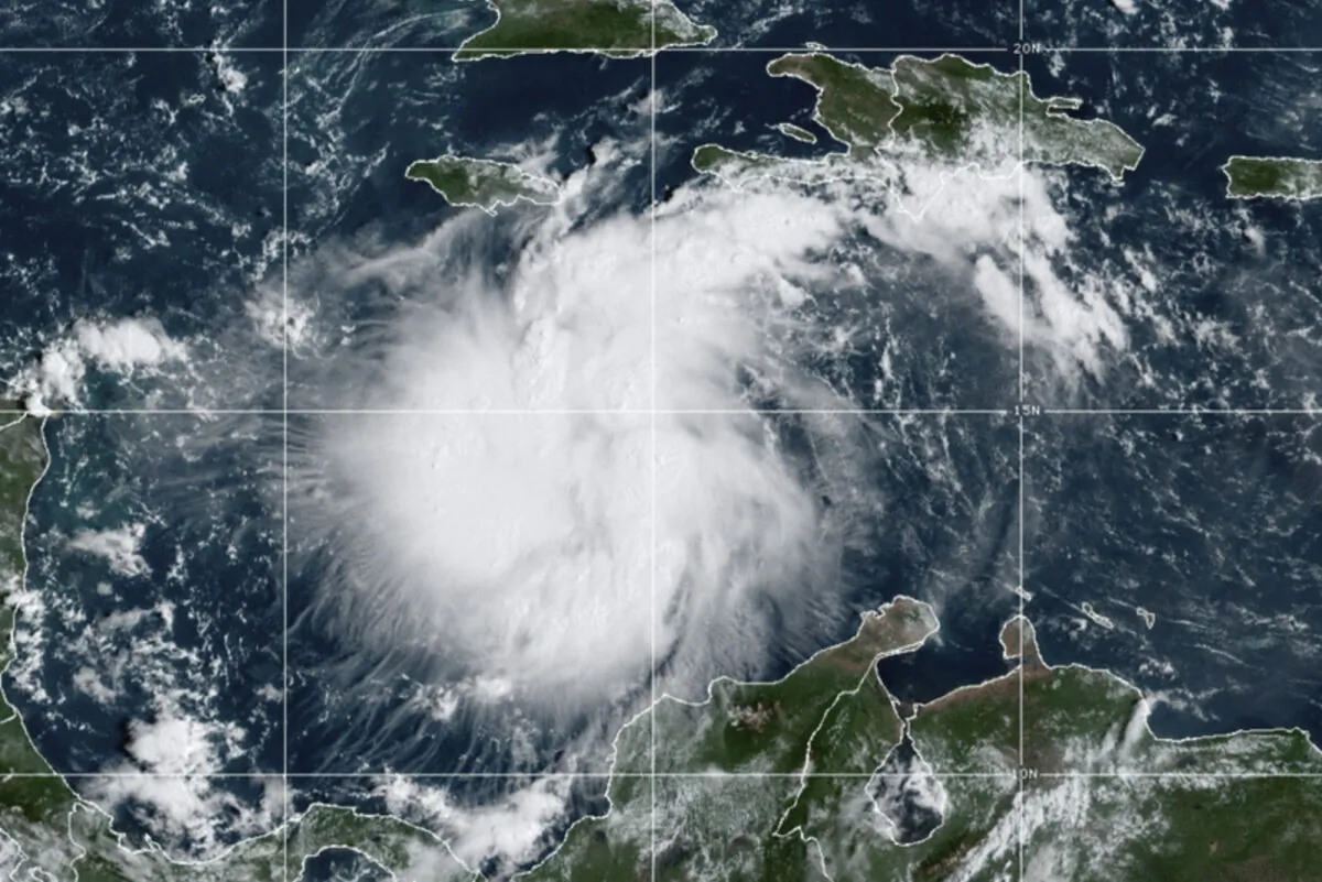 A satellite image showing Tropical Storm Ian over the central Caribbean on Sept. 24, 2022. (NOAA via AP)