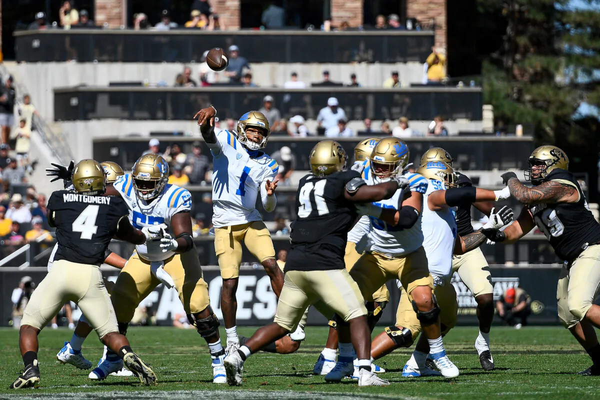 Quarterback Dorian Thompson-Robinson (1) of the UCLA Bruins passes against the Colorado Buffaloes in the third quarter at Folsom Field in Boulder, Colo., on Sept. 24, 2022. (Dustin Bradford/Getty Images)