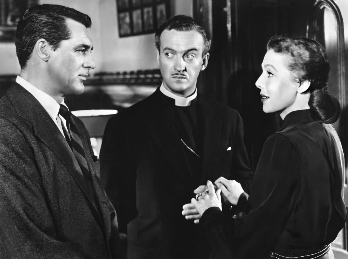 (L–R) Cary Grant as the mysterious visitor Dudley, David Niven as Bishop Henry Brougham, and Loretta Young as the bishop's wife in the 1947 film "The Bishop's Wife." (MovieStillsDB)