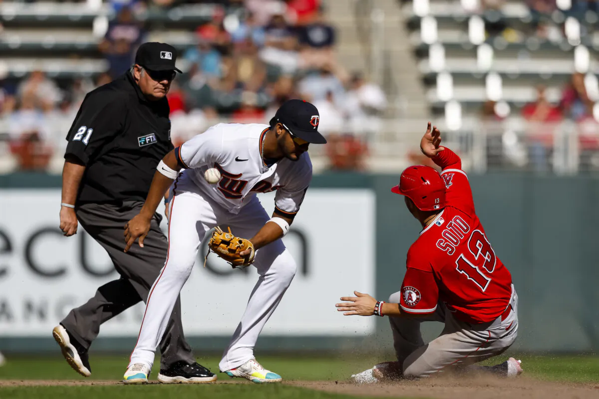 Livan Soto (13) of the Los Angeles Angels steals second base against Jermaine Palacios (87) of the Minnesota Twins in the sixth inning of the game at Target Field in Minneapolis, on Sept. 25, 2022. (David Berding/Getty Images)