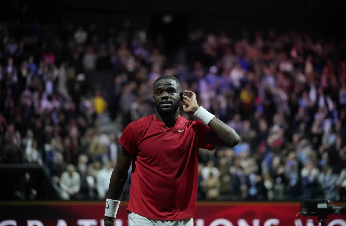 Team World's Frances Tiafoe gestures during his singles tennis match against Team Europe's Stefanos Tsitsipas on the third day of the Laver Cup tennis tournament at the O2 arena in London on Sept. 25, 2022. (Kin Cheung/AP Photo)