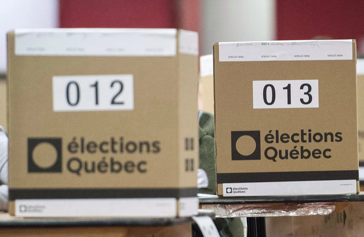 Ballot boxes are shown at a polling station in Montreal on Oct. 1, 2018, on election day in Quebec. (The Canadian Press/Graham Hughes)
