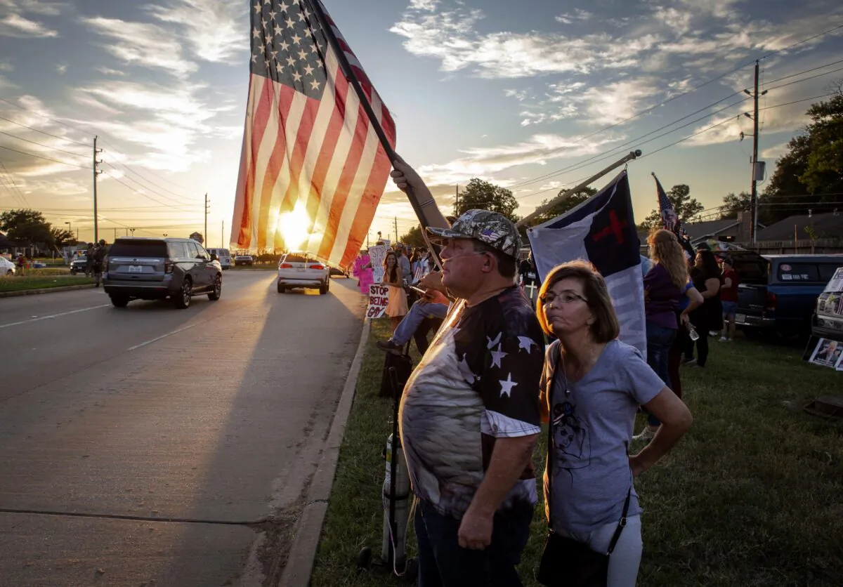Protestors demonstrate at a drag bingo fundraiser at First Christian Church in Katy, Texas, on Sept. 24, 2022. (Bobby Sanchez/The Epoch Times)