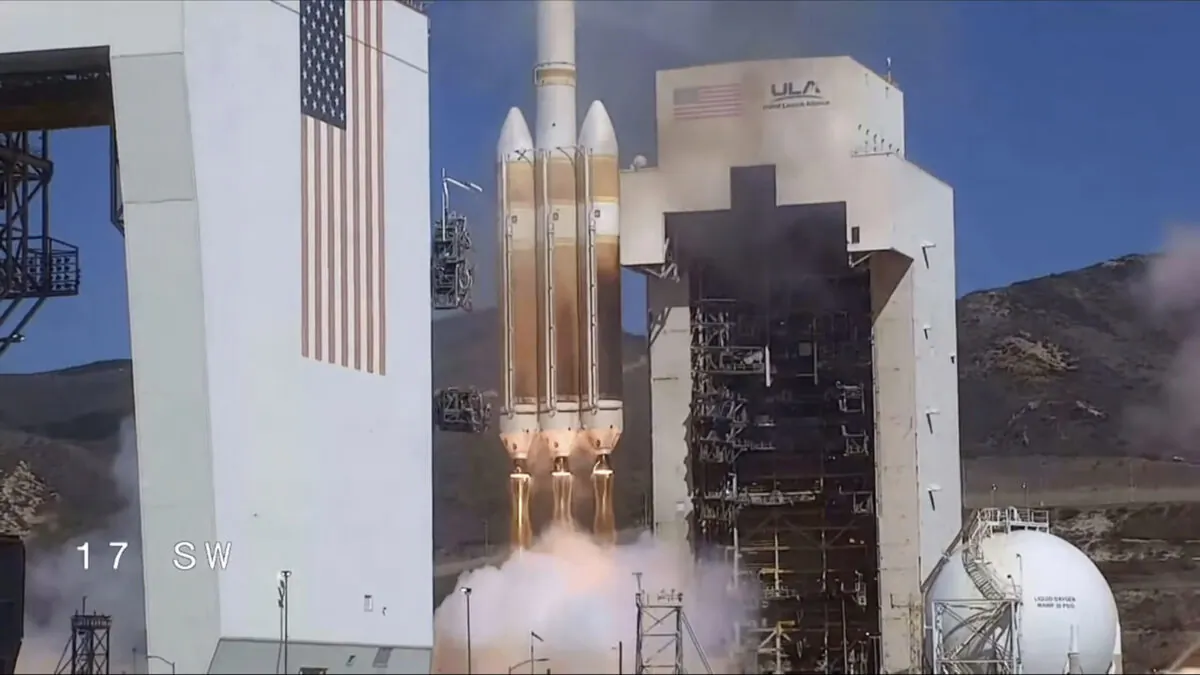 A classified satellite for the U.S. National Reconnaissance Office is launched into orbit aboard a United Launch Alliance Delta 4 Heavy rocket at Vandenberg Space Force Base in California's Santa Barbara County on Sept. 24, 2022. (United Launch Alliance via AP)