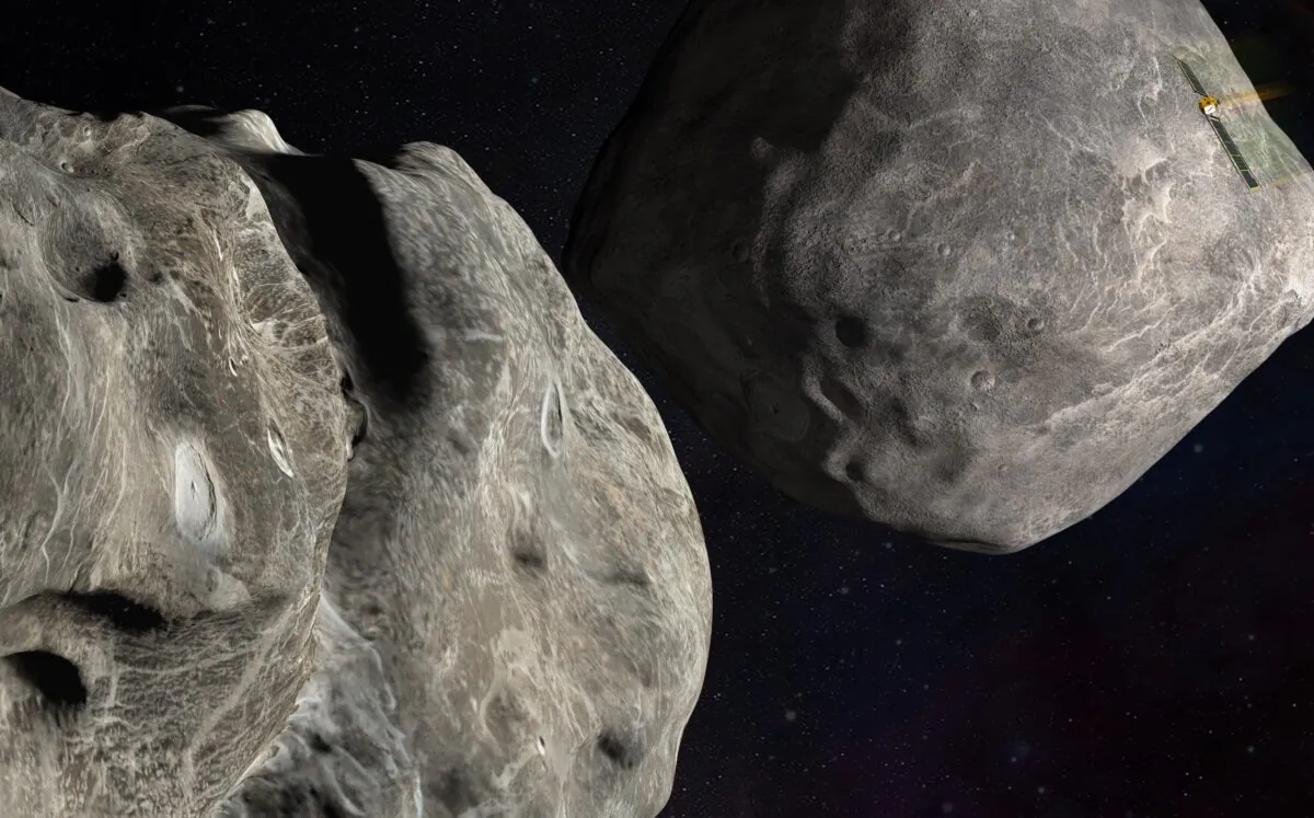 This illustration depicts NASA's DART probe, upper right, on course to impact the asteroid Dimorphos, left, which orbits Didymos. (Steve Gribben/Johns Hopkins APL/NASA via AP)