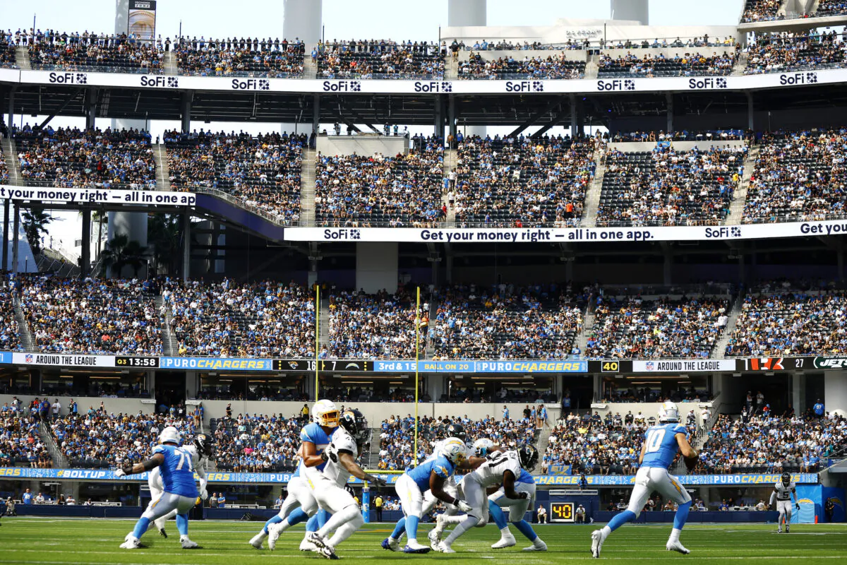 Justin Herbert (10) of the Los Angeles Chargers attempts a pass during the first half against the Jacksonville Jaguars at SoFi Stadium in Inglewood, Calif., on Sept. 25, 2022 (Ronald Martinez/Getty Images)