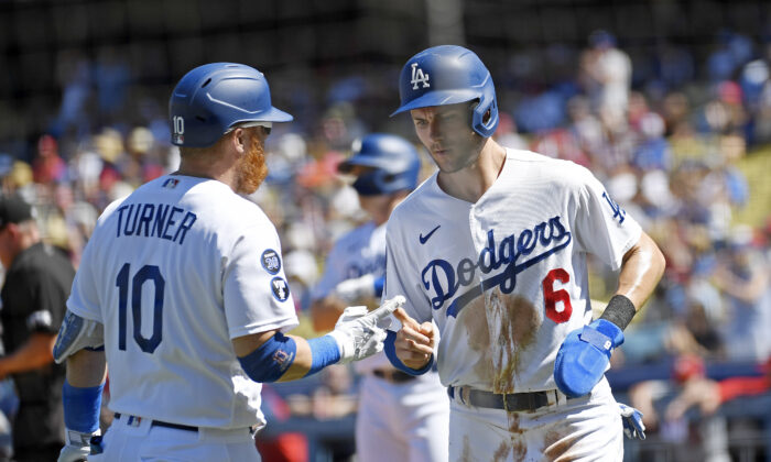 Grove helps Dodgers beat Cardinals to clinch top NL seed