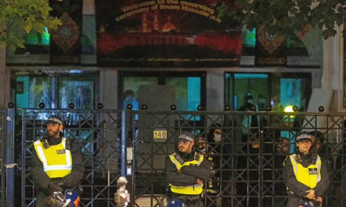 General view of the scene where protesters clashed with police outside the Islamic Centre in London, on Sept. 25, 2022. (David Parry/PA Media)