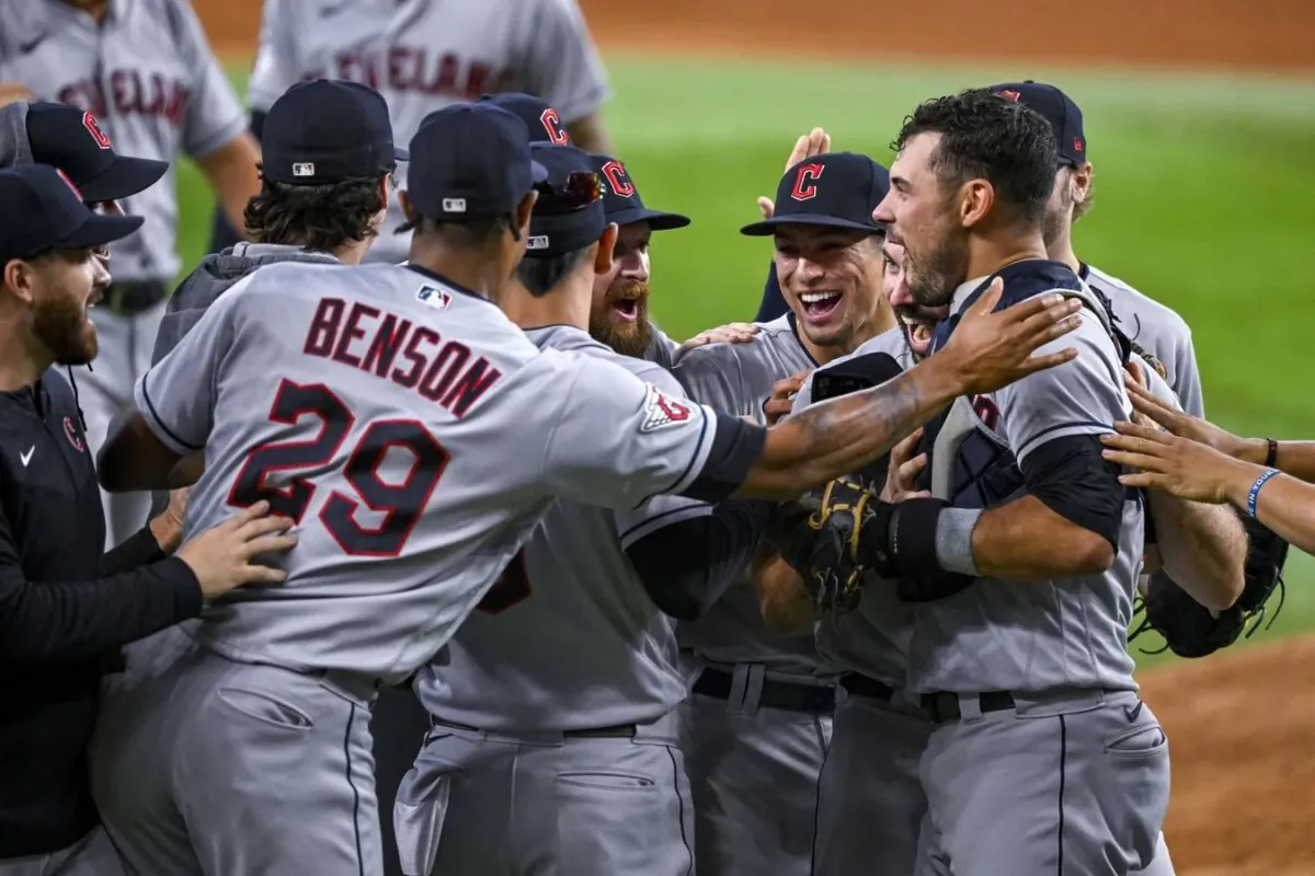 The Cleveland Guardians celebrate on the field after they clinch their first AL Central title since 2018 after the victory over the Texas Rangers at Globe Life Field in Arlington, Texas, on Sep. 25, 2022. (Jerome Miron/USA TODAY Sports via Field Level Media)