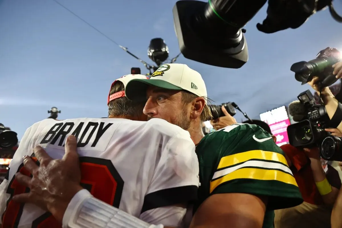 Tampa Bay Buccaneers quarterback Tom Brady (12) and Green Bay Packers quarterback Aaron Rodgers (12) greet after the game at Raymond James Stadium in Tampa, Fla., on Sep. 25, 2022. (Kim Klement/USA TODAY Sports via Field Level Media)