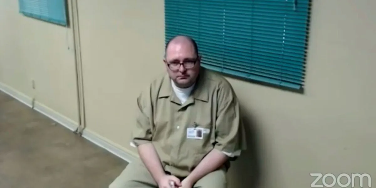 This screenshot from a Zoom video hearing shows Michael Carneal at Kentucky State Reformatory in La Grange, Ky., on Sept. 20, 2022. (Kentucky Parole Board via AP)
