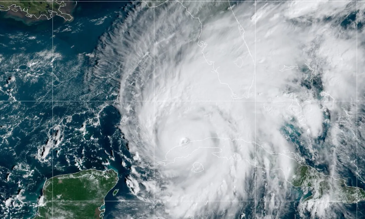 A satellite image shows Hurricane Ian off the northwest coast of Cuba at 10:30 a.m. ET on Sept. 27, 2022. (CIRA/NOAA)