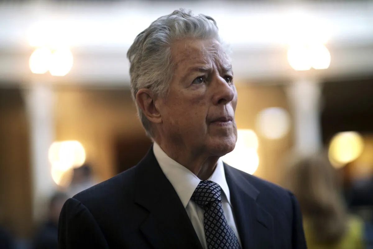 Former Governor of New Jersey, Jim Florio, stands in the Assembly chamber of the Statehouse during an event in Trenton, N.J., on March 13, 2018. (Mel Evans/AP Photo)