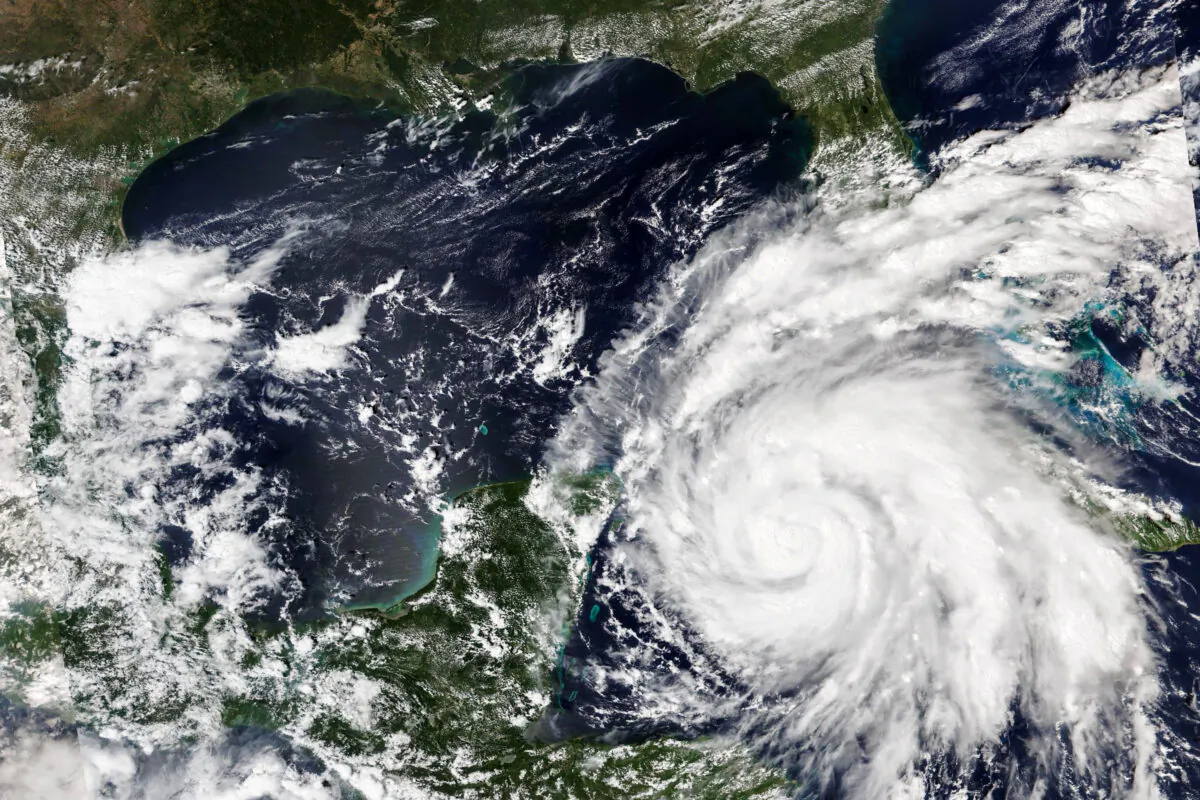 A satellite image shows Hurricane Ian growing stronger as it barreled toward Cuba on Sept. 26, 2022. (NASA Worldview/Earth Observing System Data and Information System (EOSDIS) via AP)