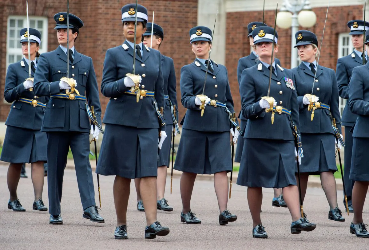 Graduating cadets parade at the Graduation Ceremony of the Queens Squadron and Sovereigns Review, at RAF College Cranwell, in eastern England, on July 16, 2020. (Julian Simmonds /Pool/AFP via Getty Images)