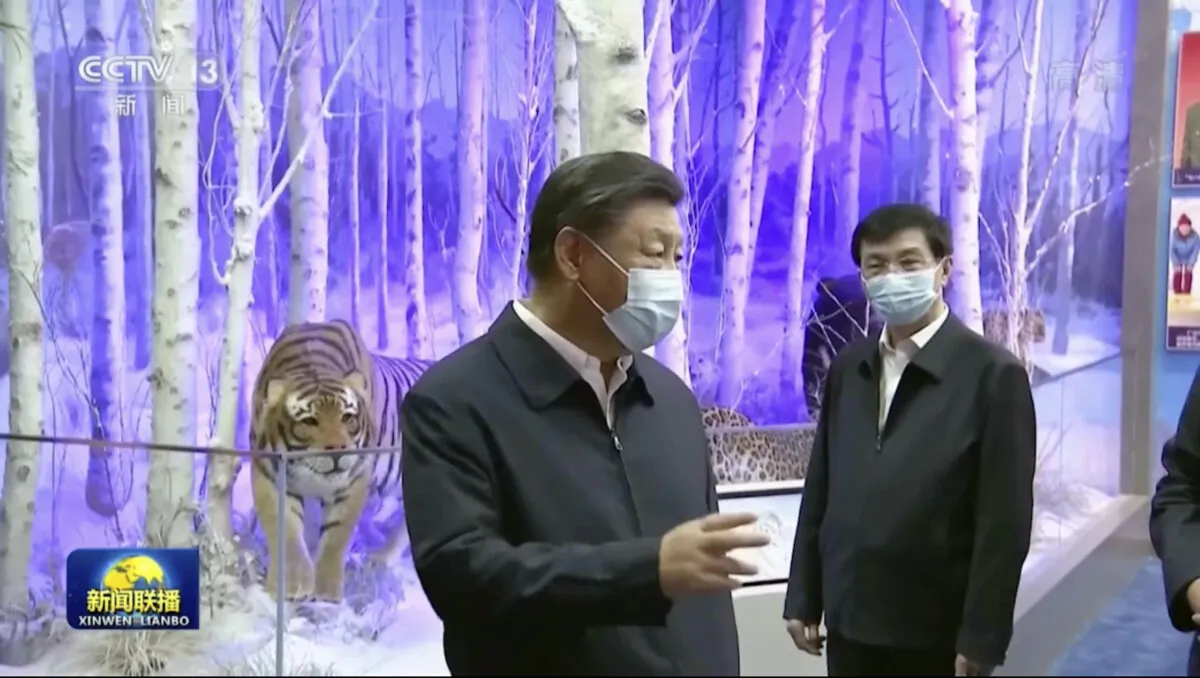 Chinese leader Xi Jinping (C) visits an exhibit at the Beijing Exhibition Hall on Sept. 27, 2022, in this image taken from video footage. (CCTV via AP)