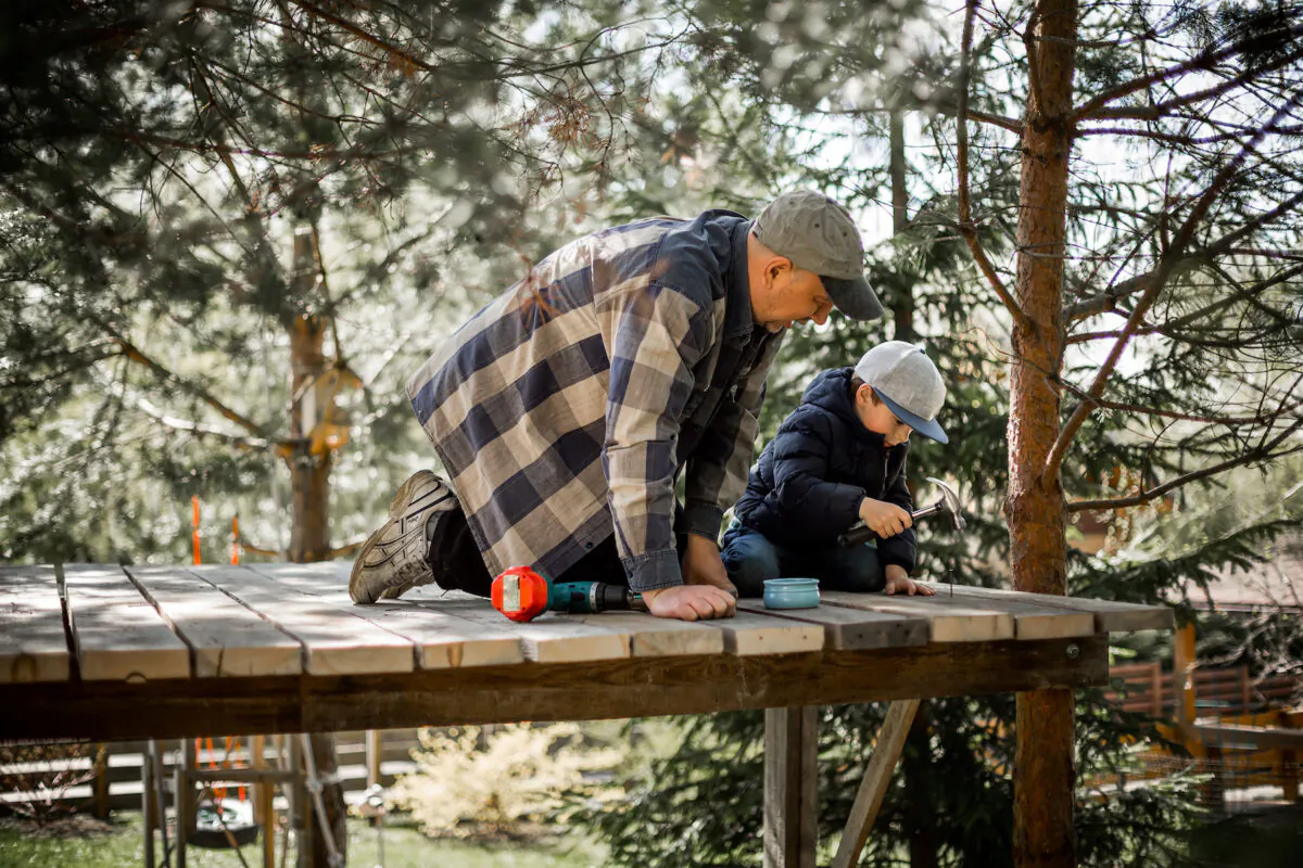 Giving young boys tools to work with lets them learn skills and offers a vision for what they can do in the future. (Smolina Marianna/Shutterstock)