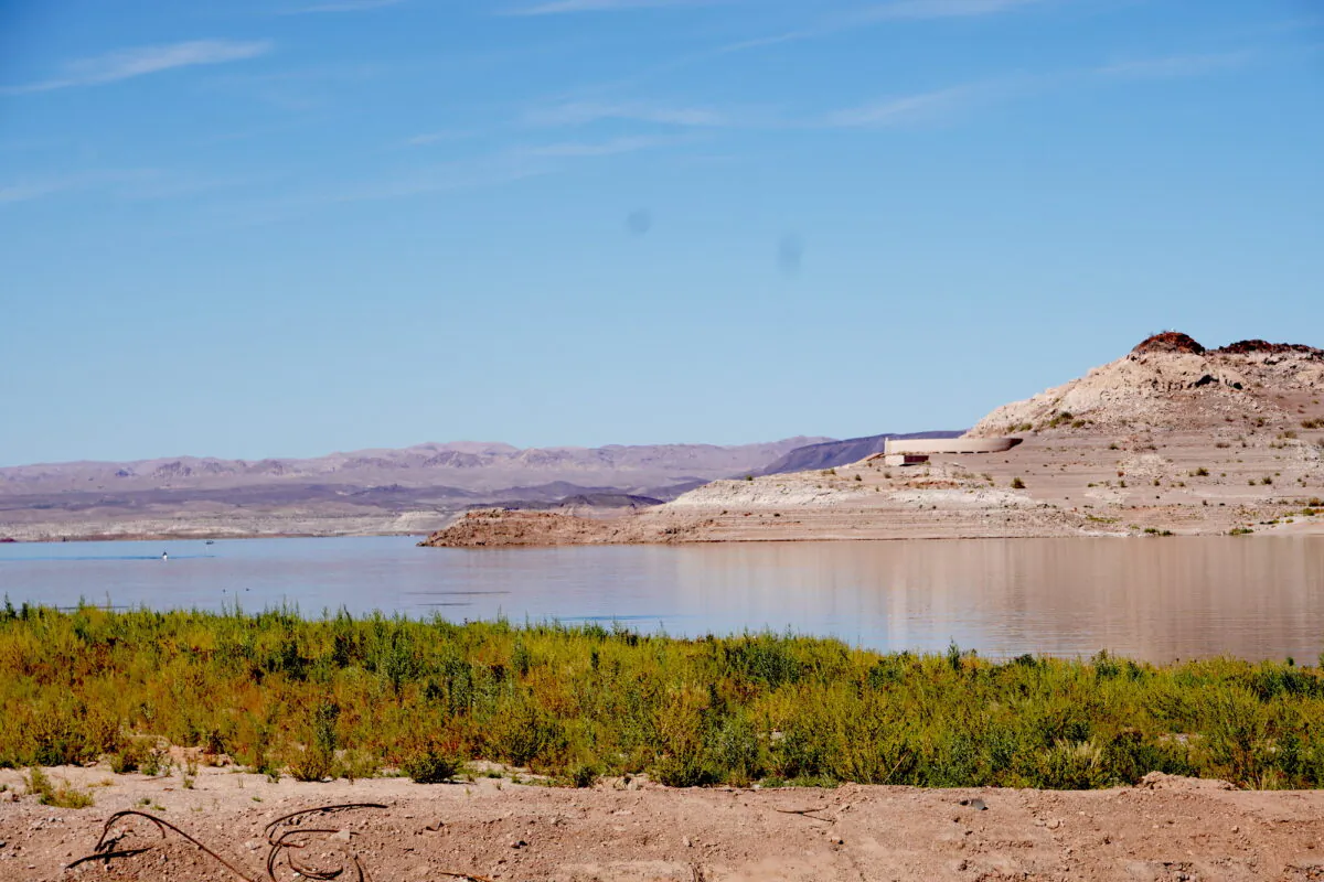 The water level at Lake Mead has dropped by about 150 feet since a regional drought began in 2000. Here, a structure lies exposed beyond the lake's Hemenway Harbor Launch Ramp in Boulder, Nev., on Sept. 22, 2022. (Allan Stein/The Epoch Times)
