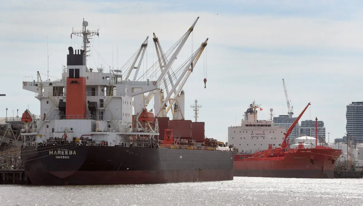 Cargo is loaded onto ships in the Port of Melbourne, in Australia, on Sept. 9, 2021. (William West/AFP via Getty Images)