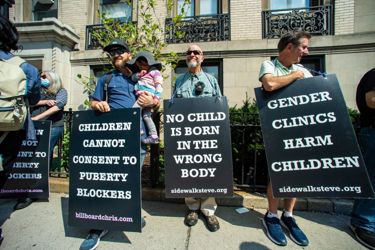 Supporters of activist Chris Elston demonstrate against gender affirmation treatments and surgeries on minors, outside of Boston Childrens Hospital in Boston, Mass., on Sept. 18, 2022. (Joseph Prezioso/AFP via Getty Images)
