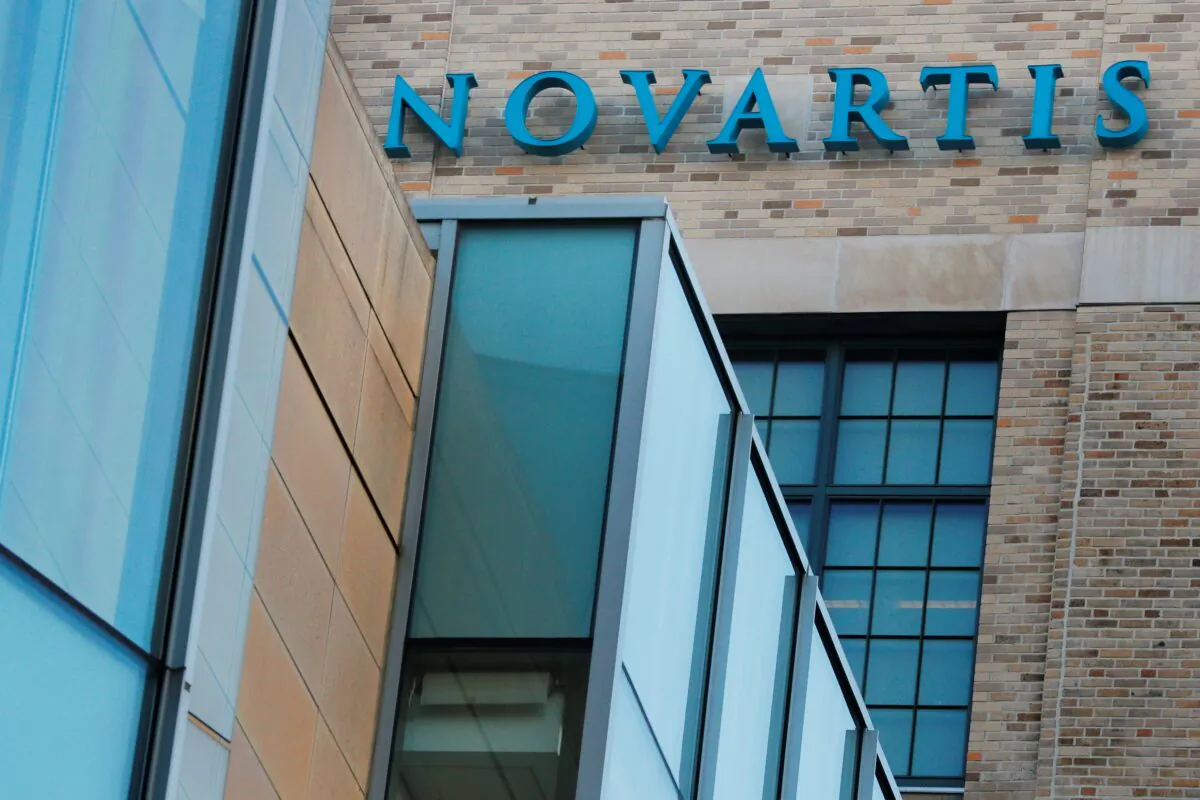 A sign marks Novartis' Institutes for Biomedical Research in Cambridge, Mass., on Jan. 2, 2020. (Brian Snyder/Reuters)