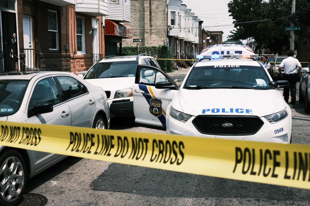 Police tape blocks a street in Philadelphia, Penn., on July 19, 2021. (Spencer Platt/Getty Images)