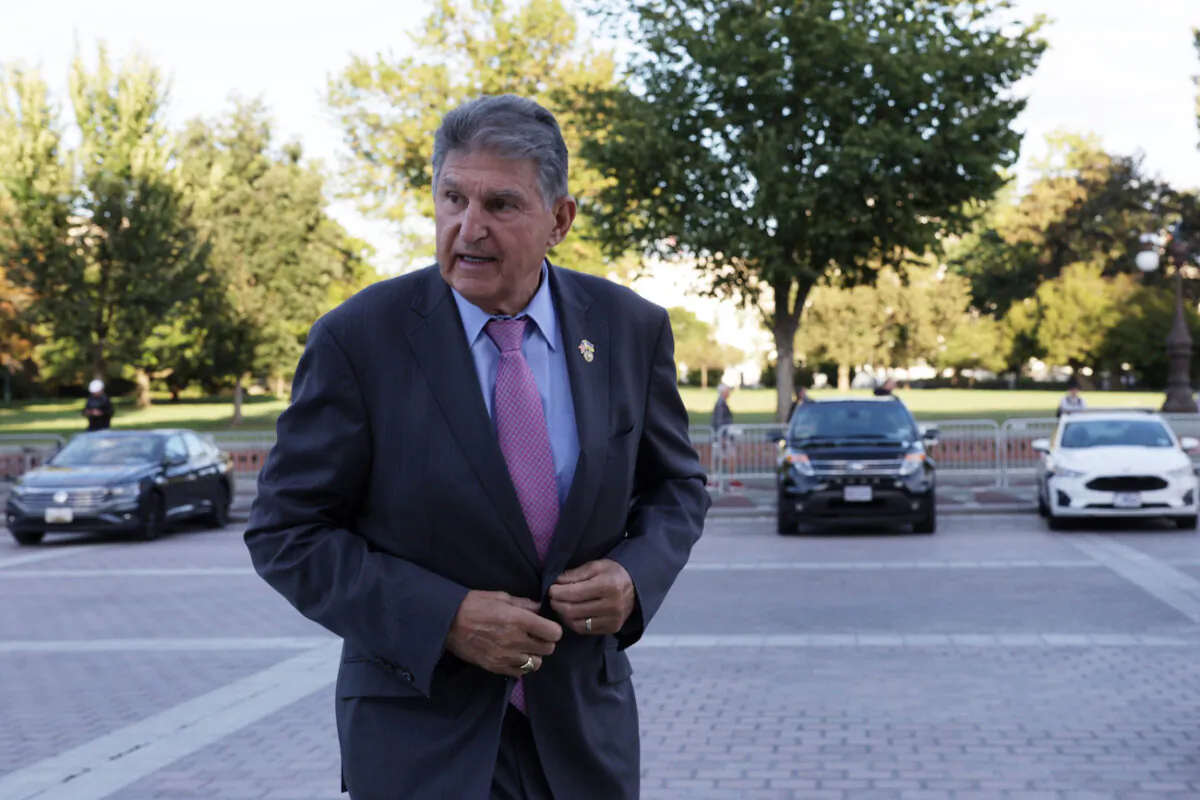 U.S. Sen. Joe Manchin (D-W.V.) arrives at the U.S. Capitol for a cloture vote of a continuing resolution to fund the government, in Washington, Sept. 27, 2022. (Alex Wong/Getty Images)