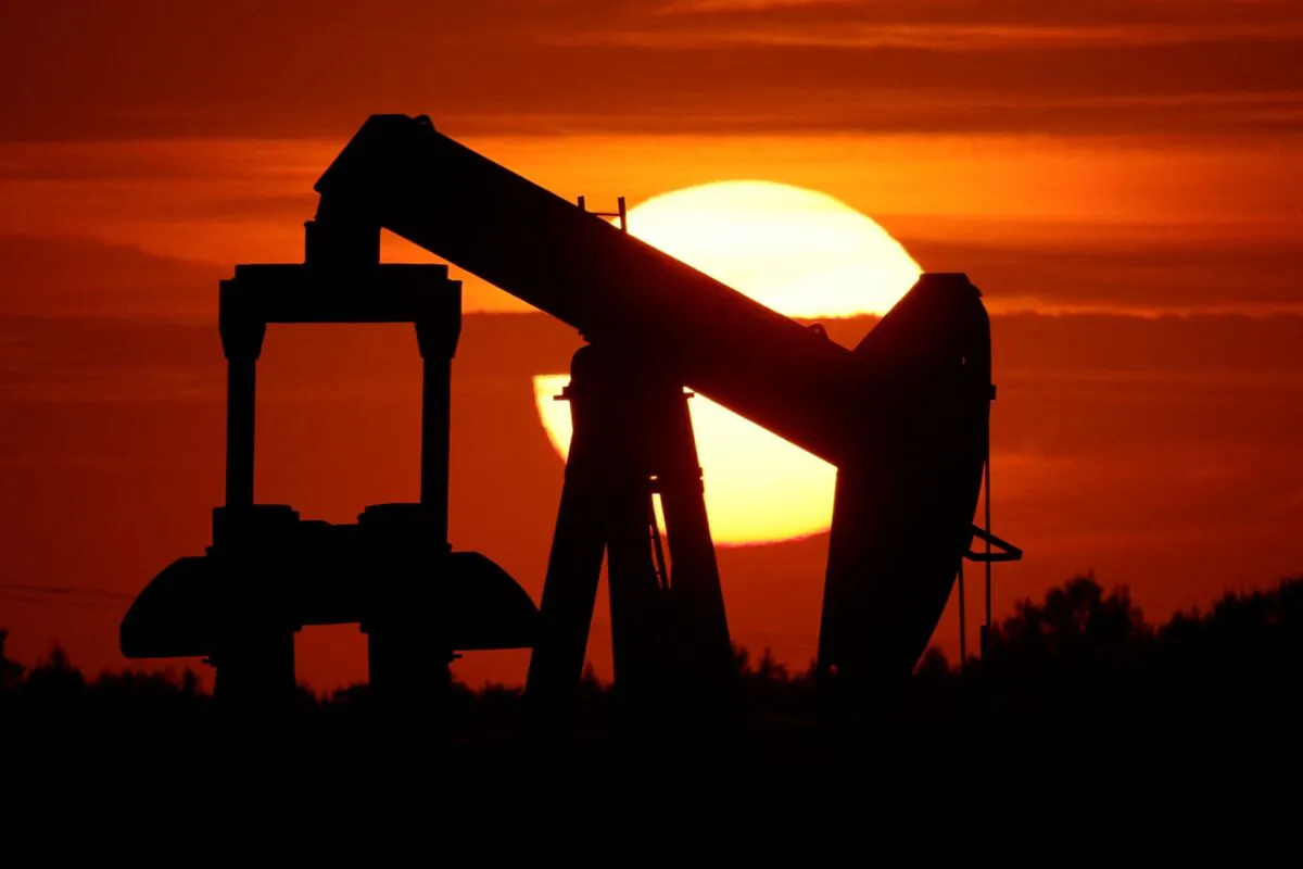 An oil pump of IPC Petroleum France is seen at sunset outside Soudron, near Reims, France, on Aug. 24, 2022. (Pascal Rossignol/Reuters)