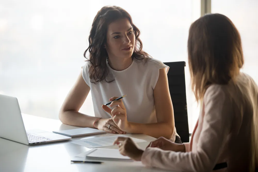 Your body language sends non-verbal messages in every conversation. (fizkes/Shutterstock)