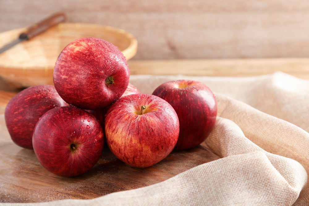 Group,Of,Gala,Apple,On,Wooden,Board,Background,,Fruits,Concept.