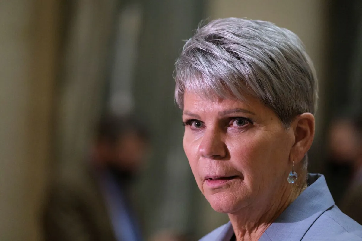 Christine Tell, Saskatchewan's minister of corrections, policing, and public safety, speaks to media at the Legislative Building in Regina on Oct. 27, 2021. (Michael Bell/The Canadian Press)