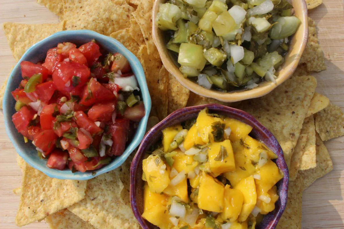These fermented mango, tomato, and tomatillo salsas all use the same basic recipe, but the resulting flavors are wildly different. (Stephanie Thurow)