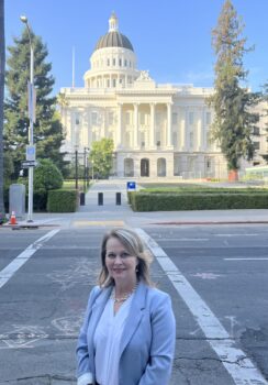 Susan Arnall, Vice President of Right to Life League, stands across the street from the California State Capitol in June 2022. 