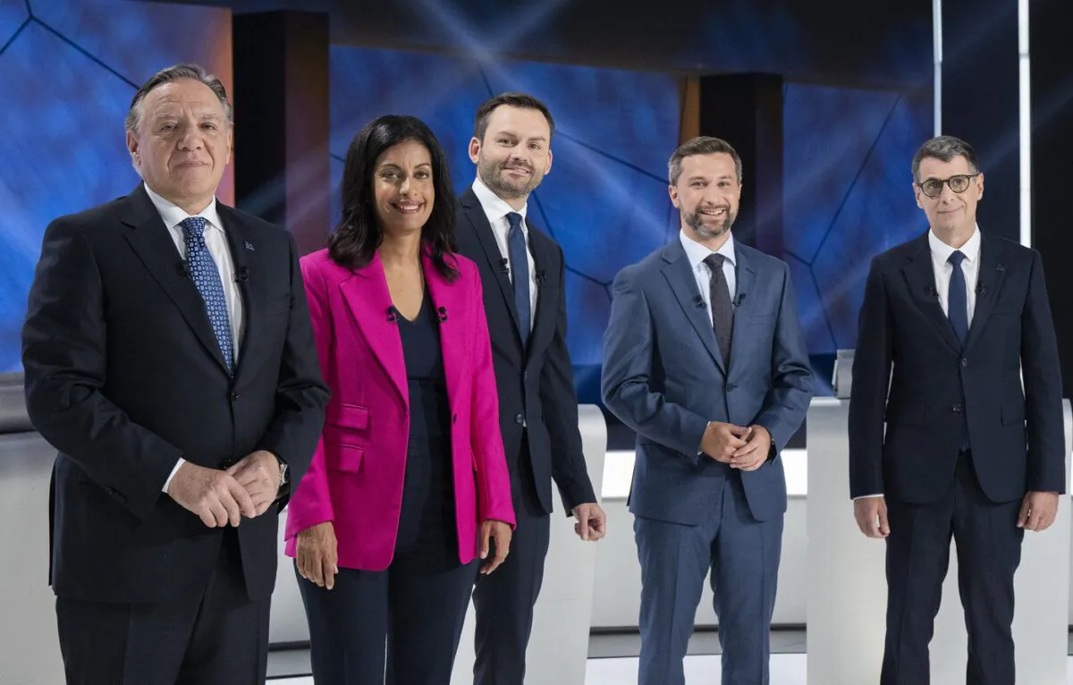 From left, Coalition Avenir Quebec Leader Francois Legault, Quebec Liberal Leader Dominique Anglade, Parti Quebecois Leader Paul St-Pierre Plamondon, Quebec Solidaire Leader Gabriel Nadeau-Dubois and Quebec Conservative Leader Eric Duhaime pose on set prior to a leaders debate in Montreal, on Sept. 22, 2022. (The Canadian Press/Ryan Remiorz)