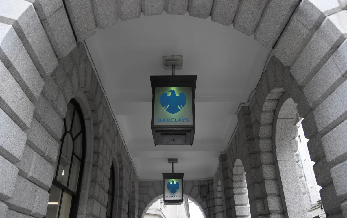 The logo of Barclays bank on glass lamps outside of a branch of the bank in the City of London financial district in London on Sept. 4, 2017. (Toby Melville/Reuters)