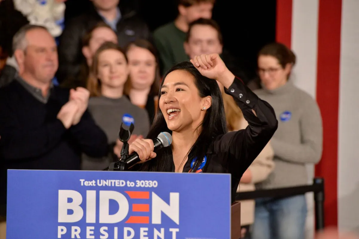 Former Olympian Michelle Kwan speaks before U.S. presidential candidate and former Vice President Joe Biden at a rally at the Rex Theatre in Manchester, New Hampshire on Feb. 8, 2020. (Joseph Prezioso / AFP via Getty Images)