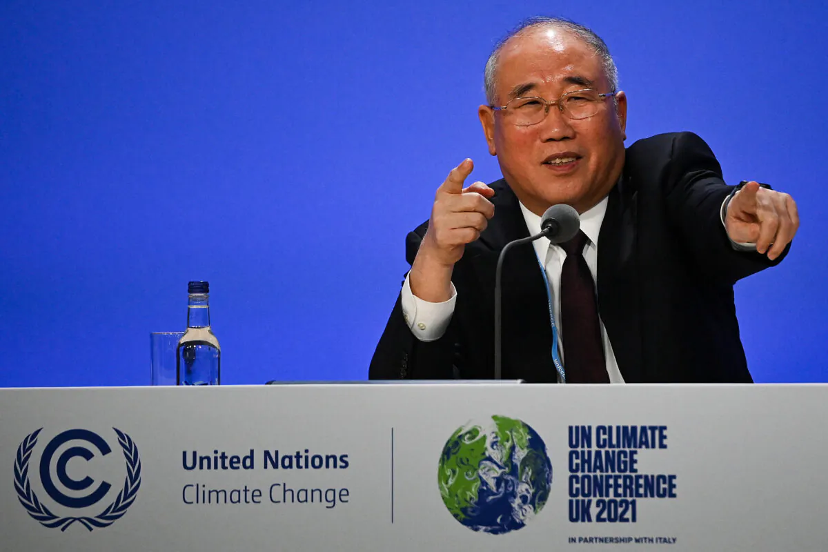 Xie Zhenhua, China’s special climate envoy, speaks during a joint China-U.S. statement on a declaration enhancing climate action at the U.N. Climate Change Conference in Glasgow, Scotland, on Nov. 10, 2021. (Jeff J. Mitchell/Getty Images)