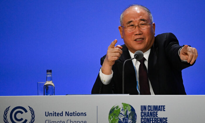 Xie Zhenhua, China’s special climate envoy, speaks during a joint China-U.S. statement on a declaration enhancing climate action at the U.N. Climate Change Conference in Glasgow, Scotland, on Nov. 10, 2021. (Jeff J. Mitchell/Getty Images)