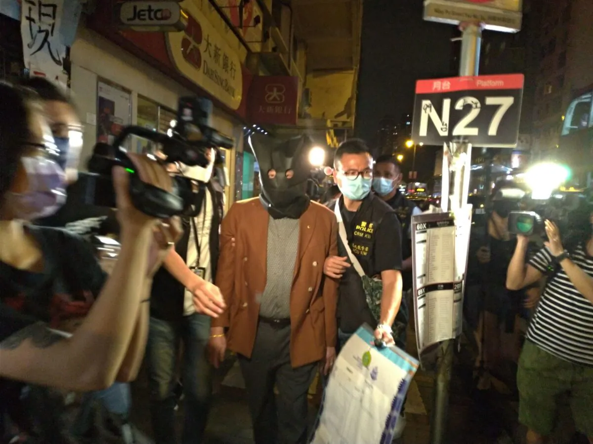 Hong Kong police arrested a 76-year-old male doctor and three female assistants from a private clinic in Yau Ma Tei, Hong Kong on Sept.20, 2022. (Lau Kong Yip/The Epoch Times)