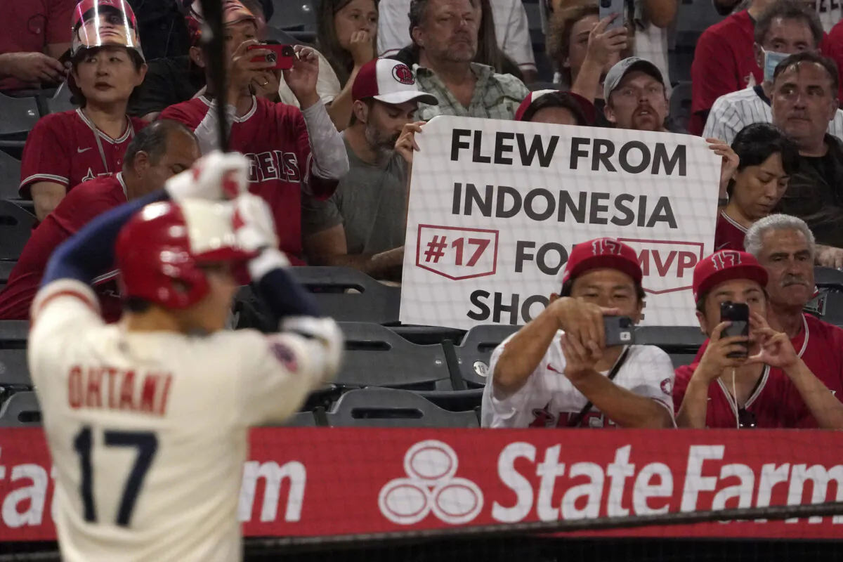 Fans take pictures of Los Angeles Angels' Shohei Ohtani as he waits to bat during the first inning of a baseball game in Anaheim, Calif., on Sept. 29, 2022. (Mark J. Terrill/AP Photo)