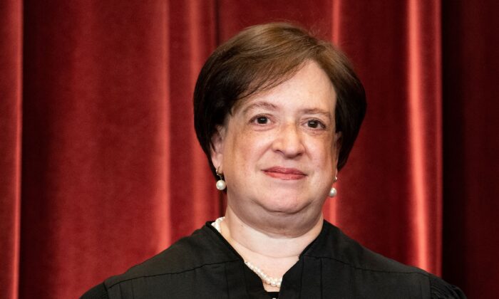 Supreme Court Justice Elena Kagan stands for a group photograph of the Justices at the Supreme Court in Washington on April 23, 2021. (Erin Schaff/Pool/AFP via Getty Images)