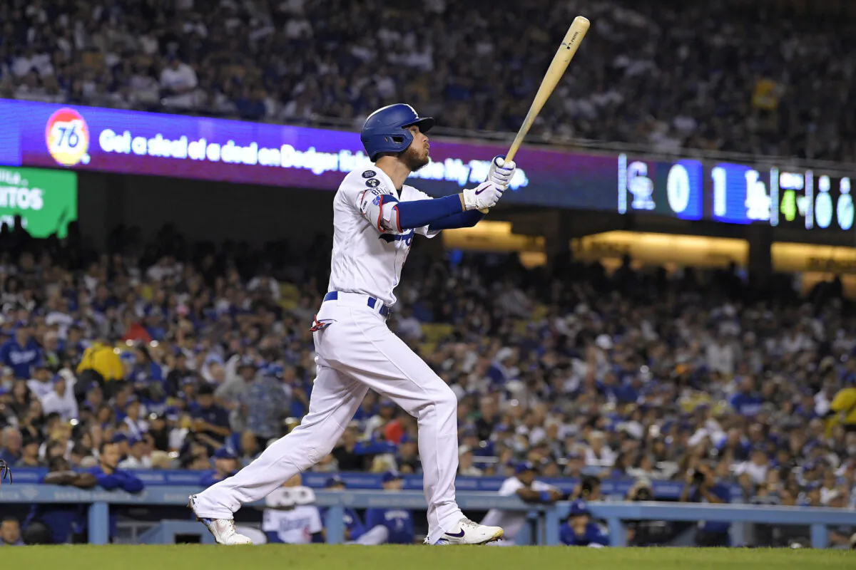 Los Angeles Dodgers' Cody Bellinger hits a three-run home run during the fourth inning of a baseball game against the Colorado Rockies in Los Angeles, on Sept. 30, 2022. (Mark J. Terrill/AP Photo)